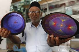 Haja Mohideen Mohammed Shariff working on a headwear piece