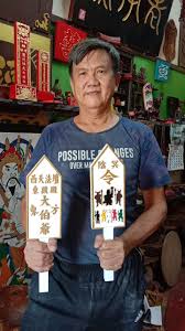 A master woodcarver from Penang